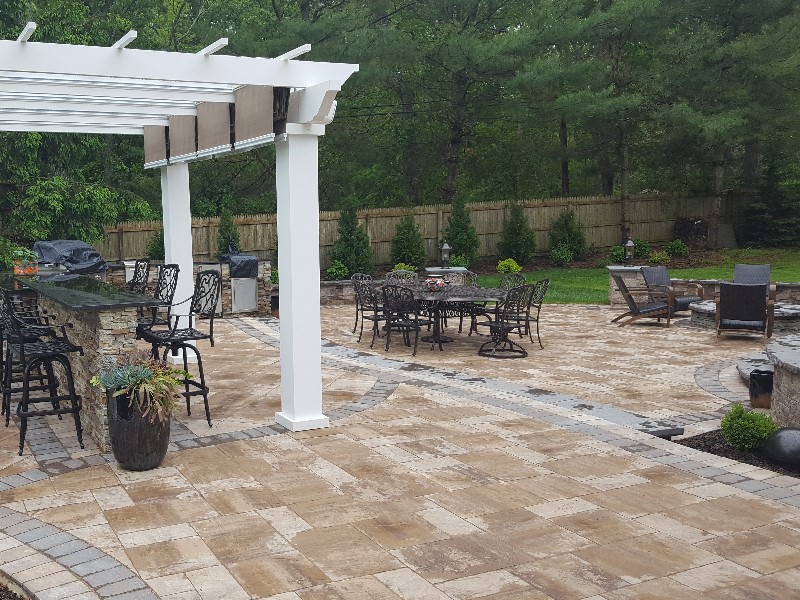 cambridge paver patio with bar island and pergola